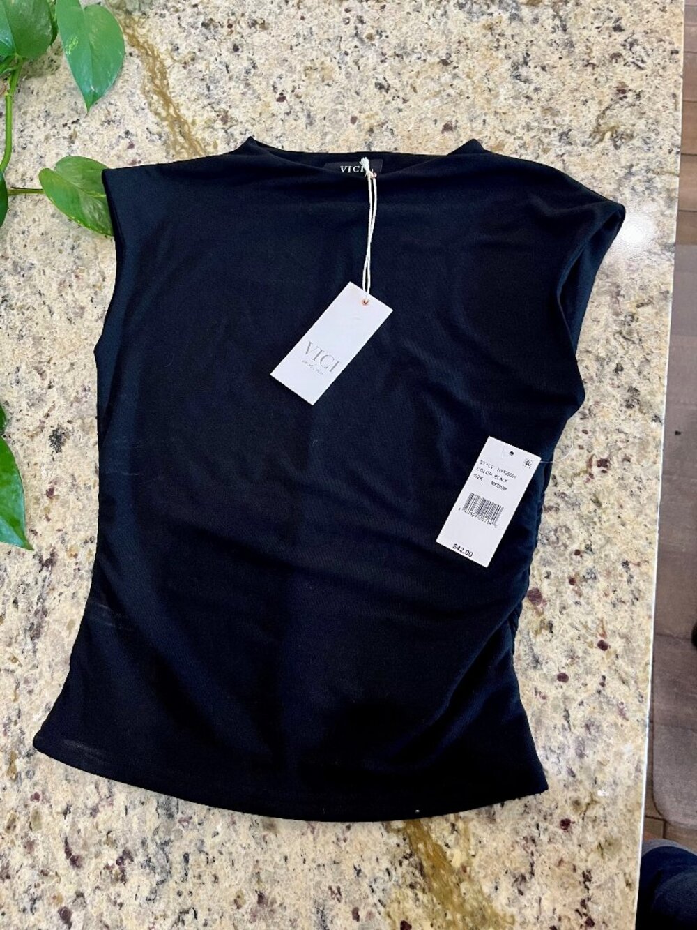 Black sleeveless blouse